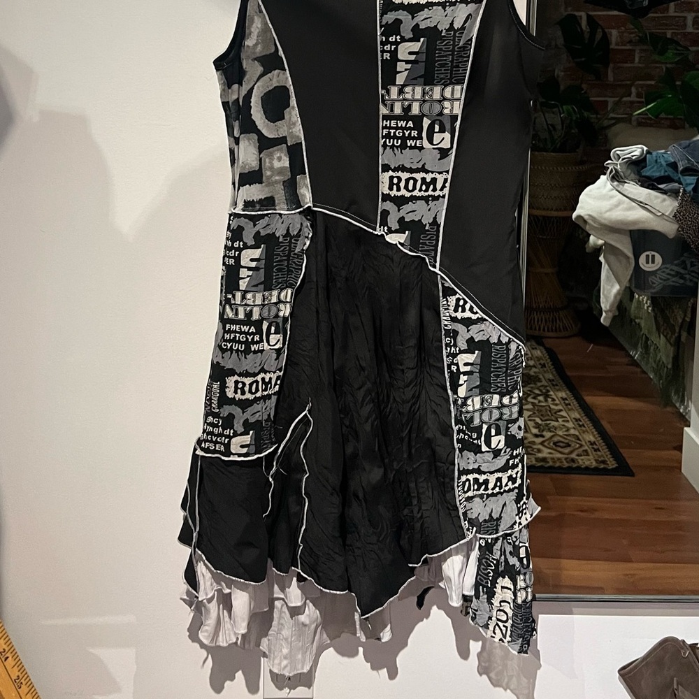 Newspaper dress with black and white patchwork layers - Picture 3 of 10